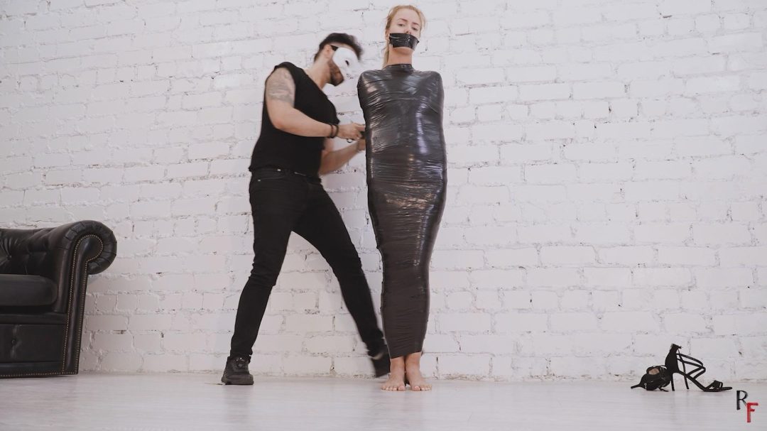 Anna Luna Mummified in Black Duct Tape - Struggling Around and Spinning on a Turntable in a Leather-2