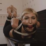 Gadya is hogtied tightly