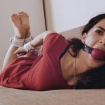 Praskovya hogtied and ballgagged