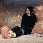 Kate Anima. Bound with tape and rope